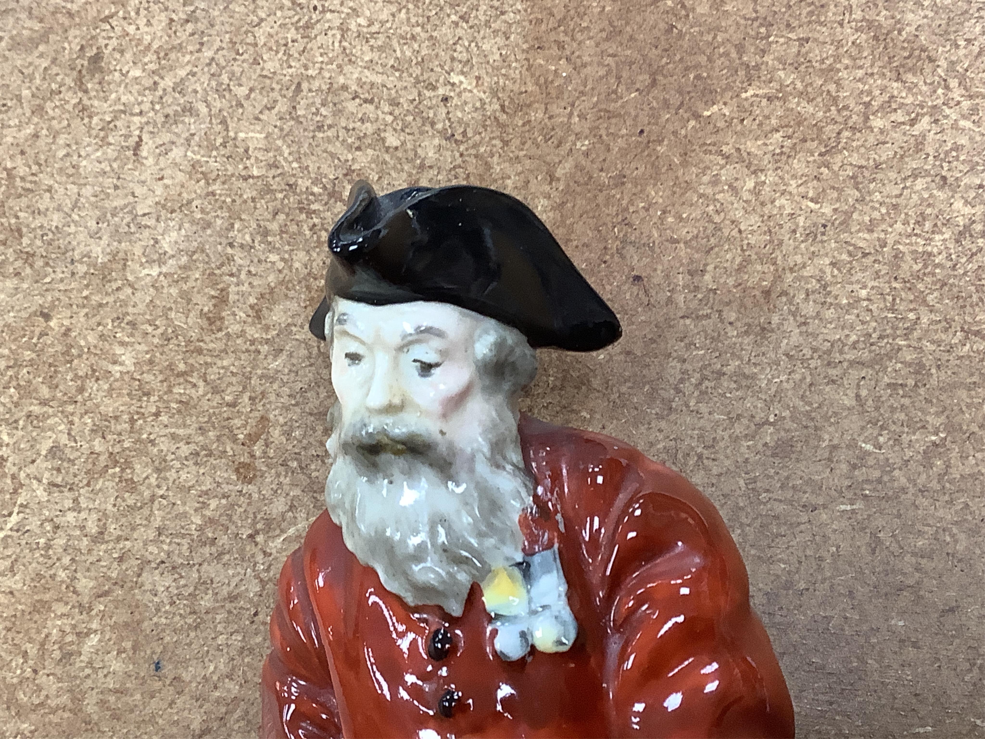 A Royal Doulton figure ‘A Pensioner’ HN689, 15cm high